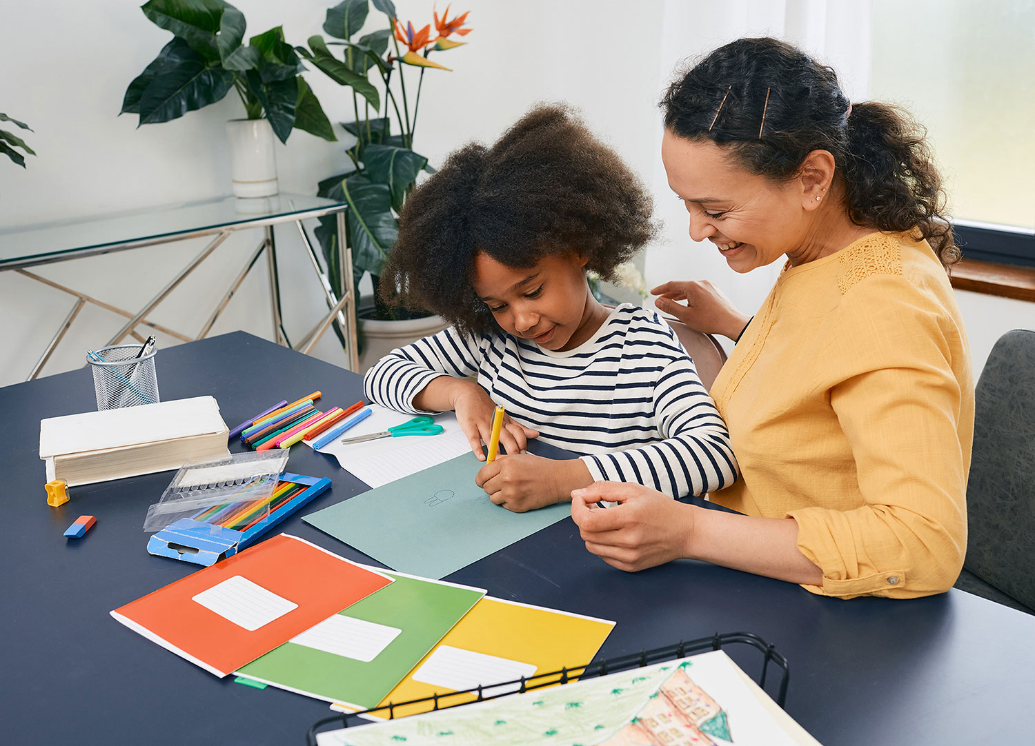 child learning with behavioral therapist